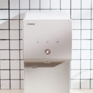 front-view-of-home-water-purifier-with-touch-panel-being-displayed-coway-cinnamon.jpg